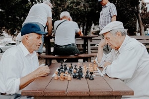 Elderly playing chess image